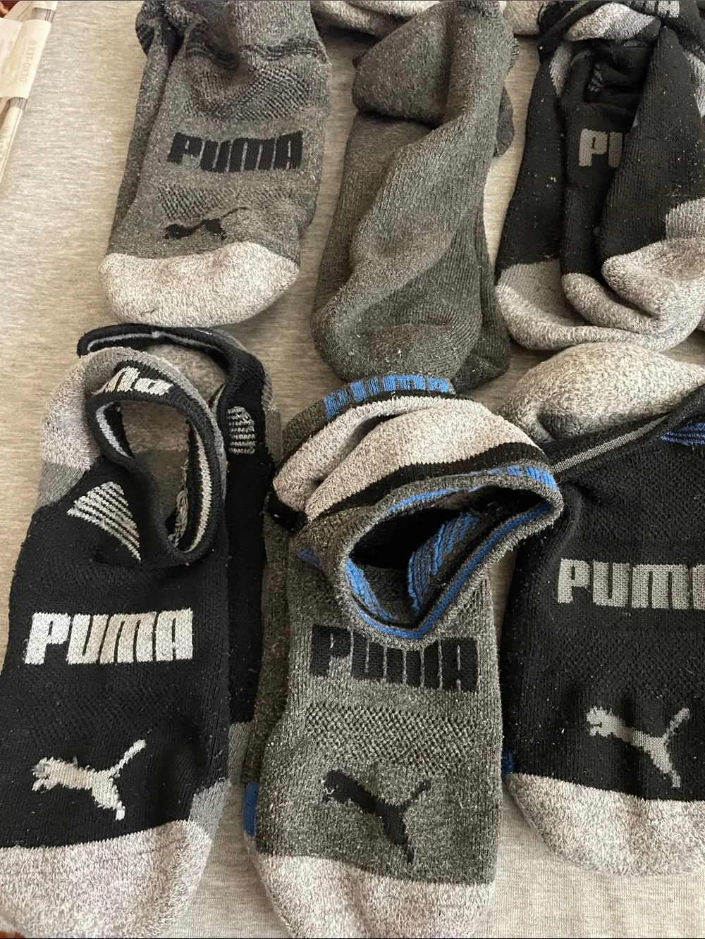 17 pairs of Puma Men's No-Show Athletic Socks in Black and Gray with Blue Accent